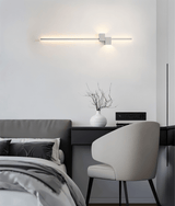 Integrated LED wall sconce with seamless bulb free housing