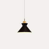 Green bell pendant shade with warm wood top and slim copper stem