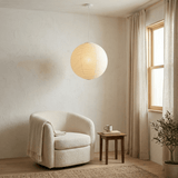 Ribbed washi paper globe pendant with a white suspension wire, view 9