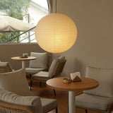 Spherical rice paper pendant light with a black suspension wire, view 22