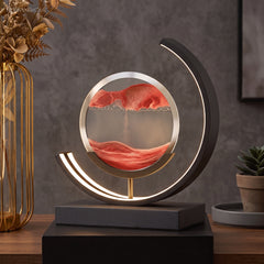 Kinetic sand lamp with curved LED light on styled console table
