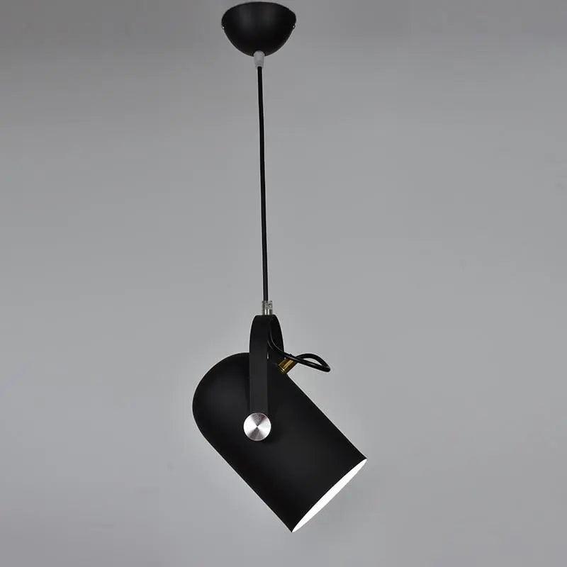 Black pendant tilted downward from a black ceiling rose