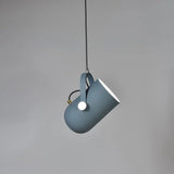 Blue spot pendant angled downward against a grey background