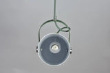 Underside view of a green pendant showing the lamp holder