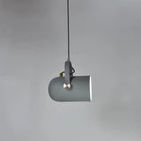 Grey pendant angled sideways showing the white shade interior