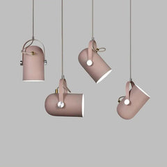 Four pink pendants shown at different heights and tilt angles
