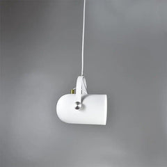 White spot pendant angled sideways against a grey background