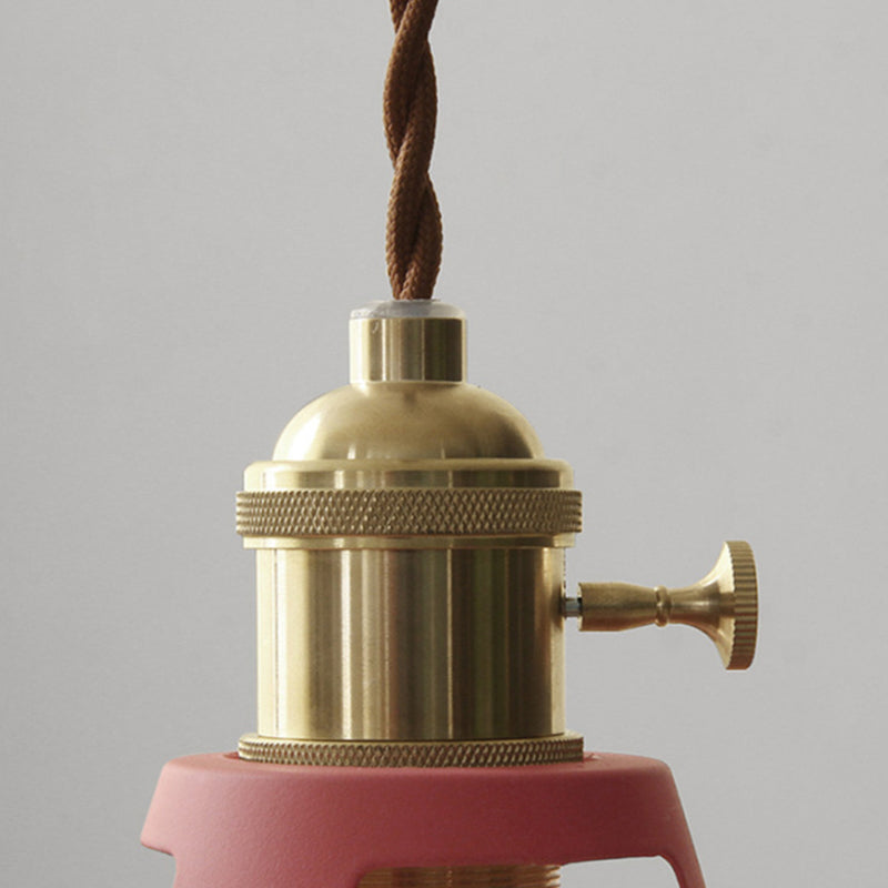 Close up of the brass lamp holder and twisted fabric cord
