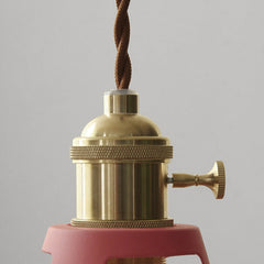 Close up of the brass lamp holder and twisted fabric cord