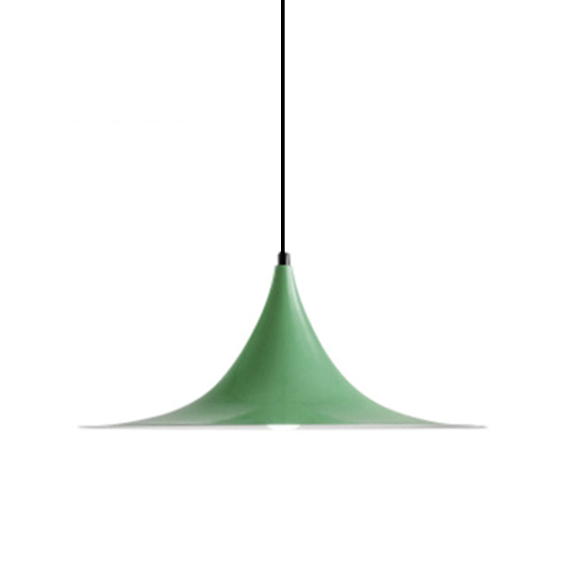 Green flared metal pendant shade on a cord, shown against white