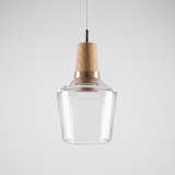 Tall clear glass bell shade with a natural wood top on a cable