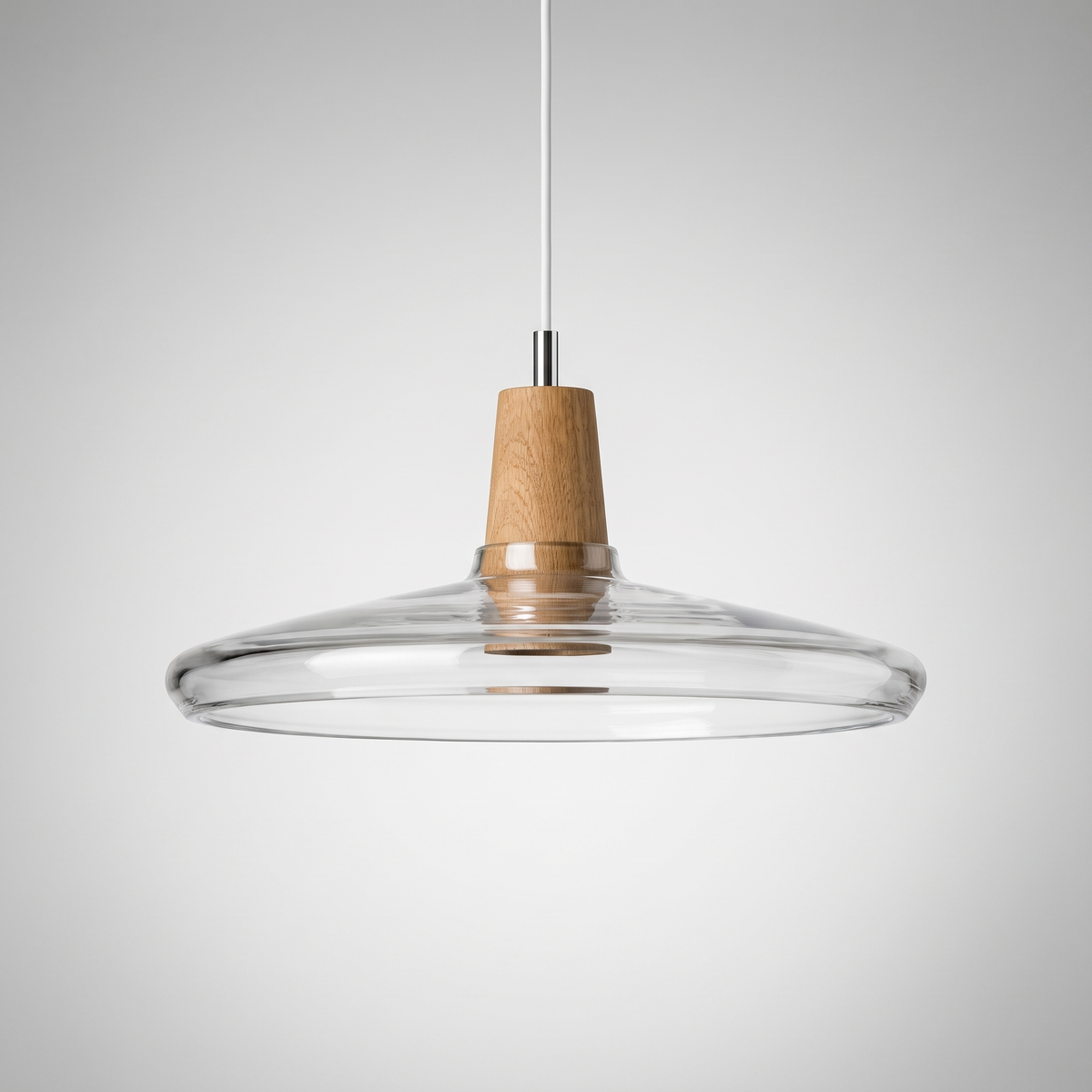 Wide clear glass saucer shade with a tapered wood top