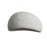 Grey speckled wabi sabi dome pendant alone on a white ground