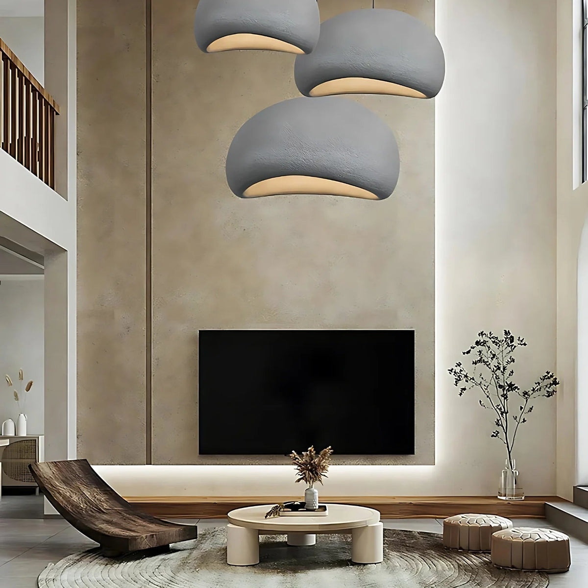 Cluster of white dome pendants lit in a double height living room