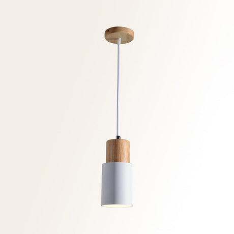 Studio shot of the pale gray pendant with its wood top