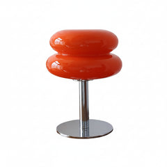 Close-up of lamp with table handmade glass shade texture