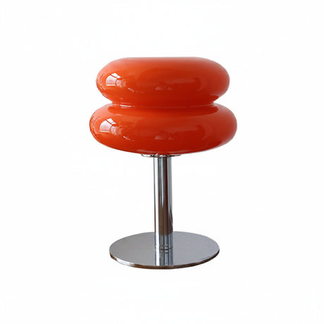 Close-up of lamp with table handmade glass shade texture