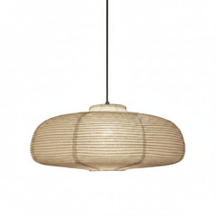 Wide disc paper lantern shade shown lit on a plain background