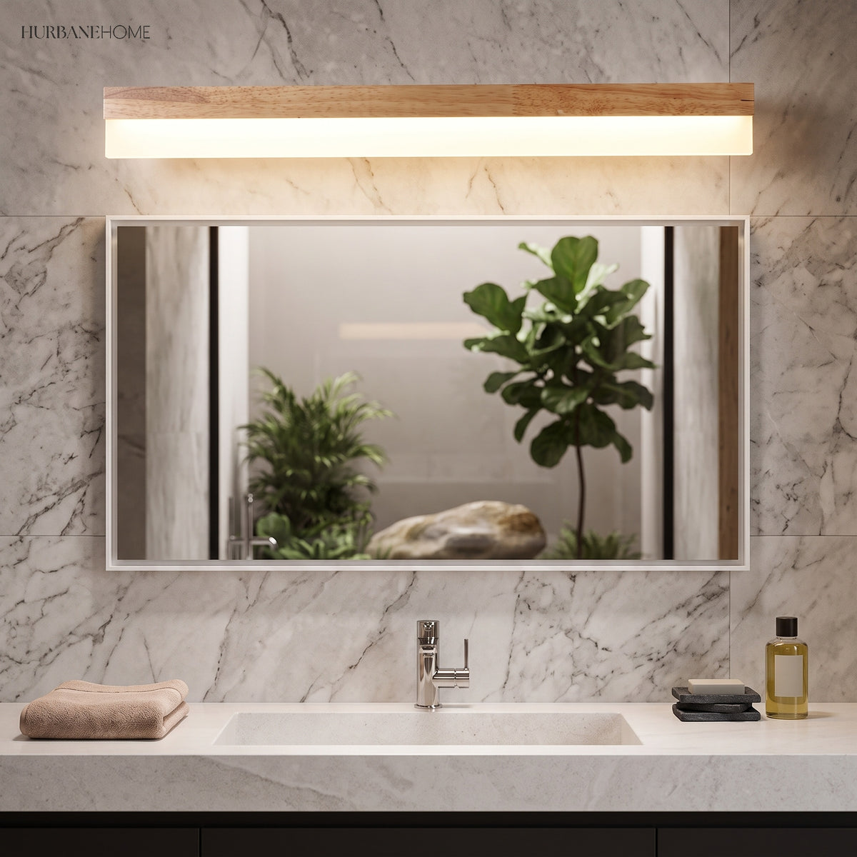 Straight wood vanity light above a wide mirror and marble wall
