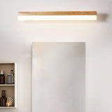 Straight wood vanity light above a tall mirror and open shelving