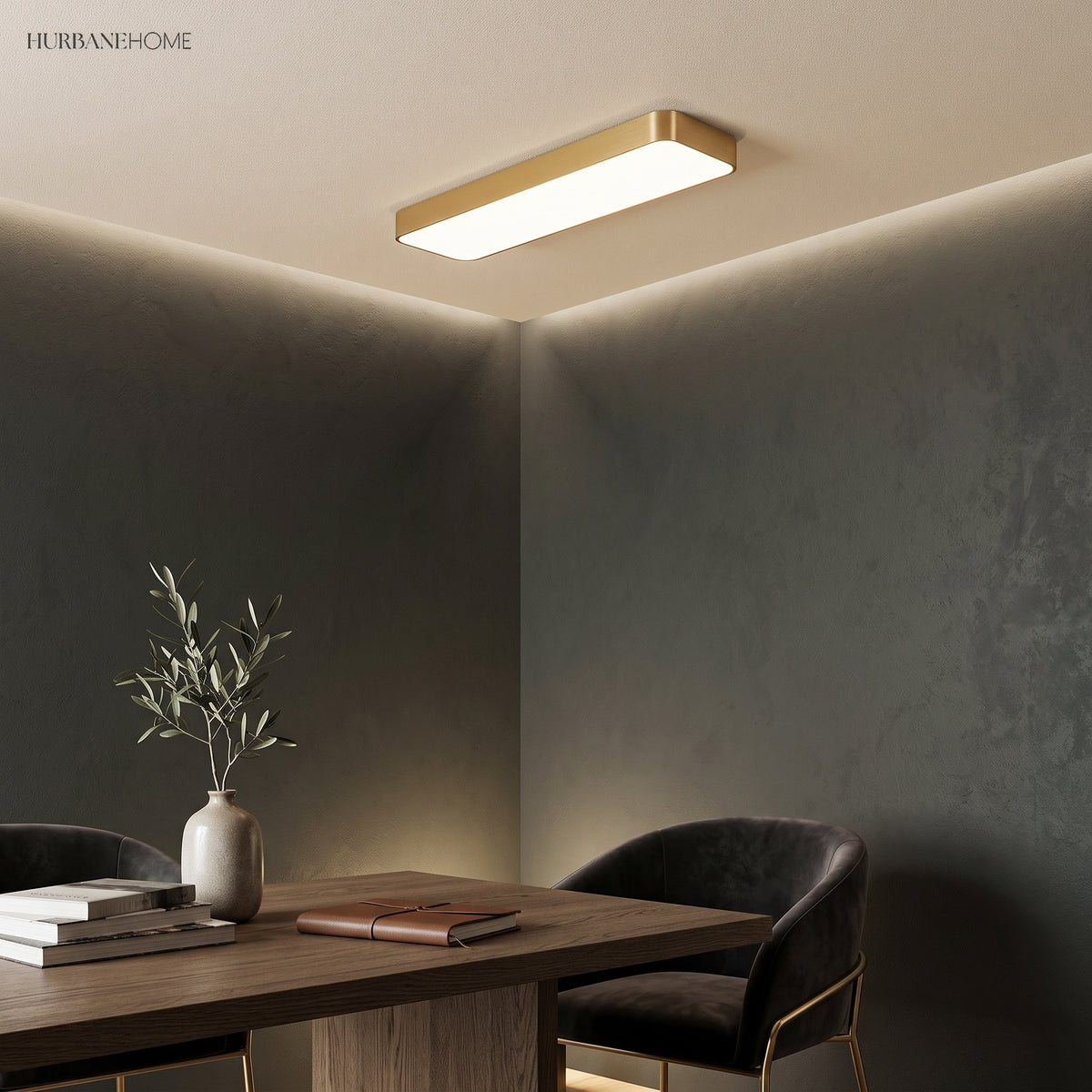 Gold LED ceiling panel lit above a desk and a black chair