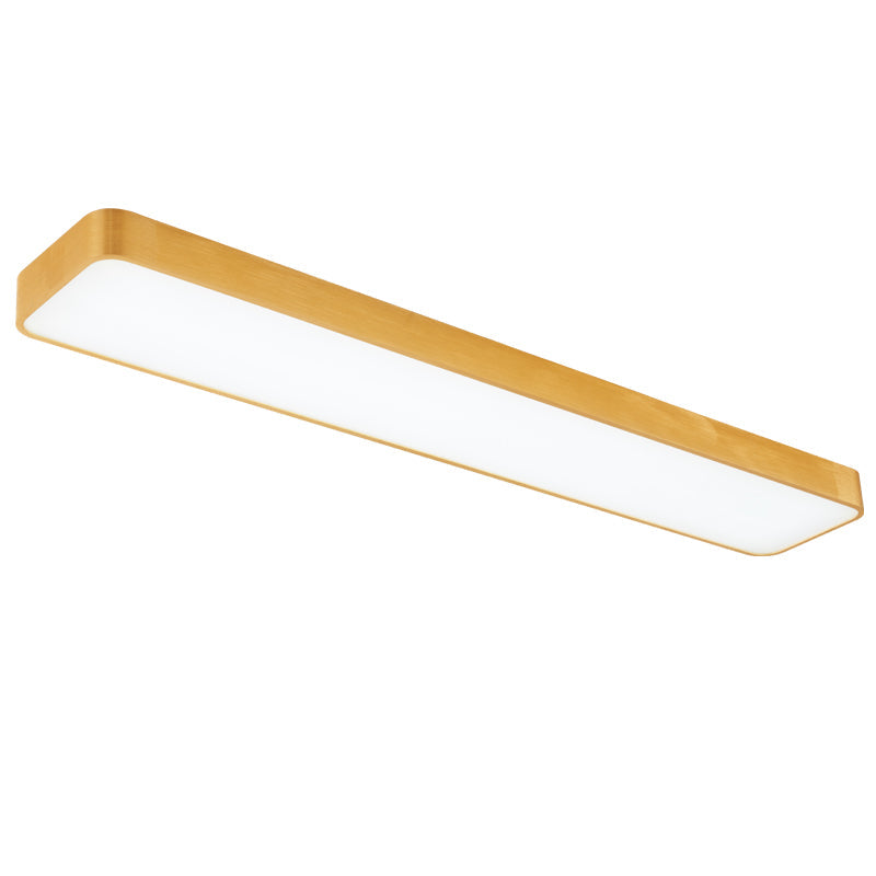 Gold LED ceiling panel photographed from below against white