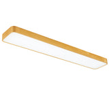 Gold LED ceiling panel photographed from below against white