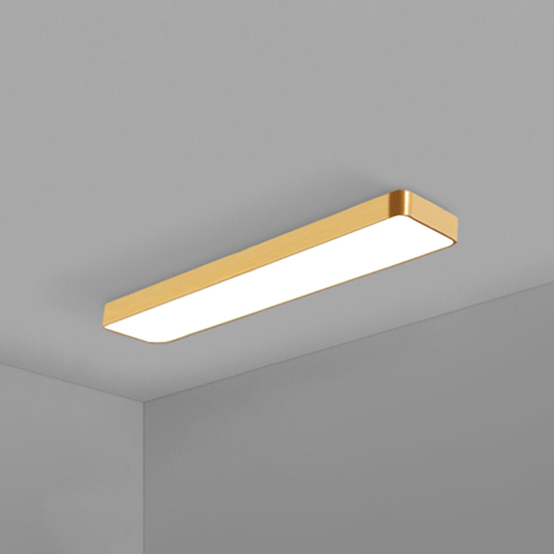Narrow gold LED ceiling panel with an even white glow
