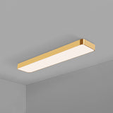 Gold LED ceiling panel shown at an angle with the lens lit