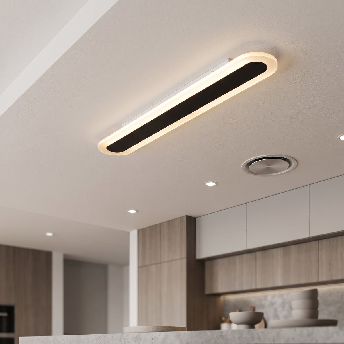 Coffee linear flush mount ceiling light above a modern kitchen