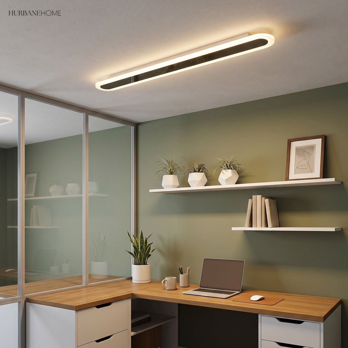 White linear flush mount lighting a home office with green walls