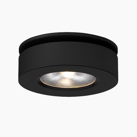 Product view of the black round spotlight with a recessed lens