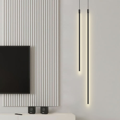 LED tube pendant light glowing in a living room