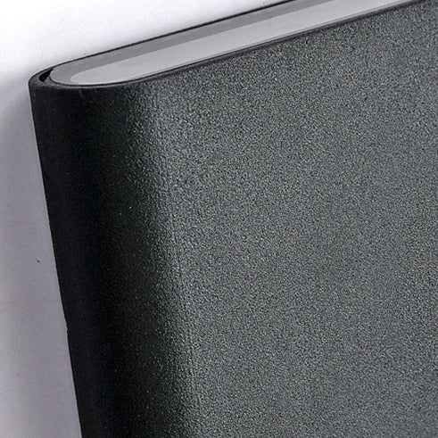 Close up of the textured black aluminum body and light slot