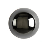 Black mirrored dome sconce photographed alone on a white ground