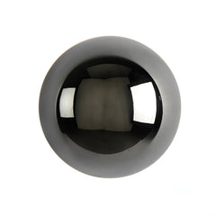 Black mirrored dome sconce photographed alone on a white ground