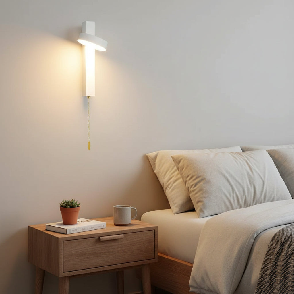 White bar sconce with a rotating head and a pull chain switch