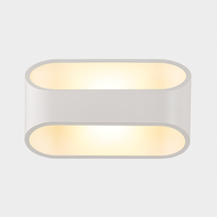 White oval sconce seen from the front with both bands lit