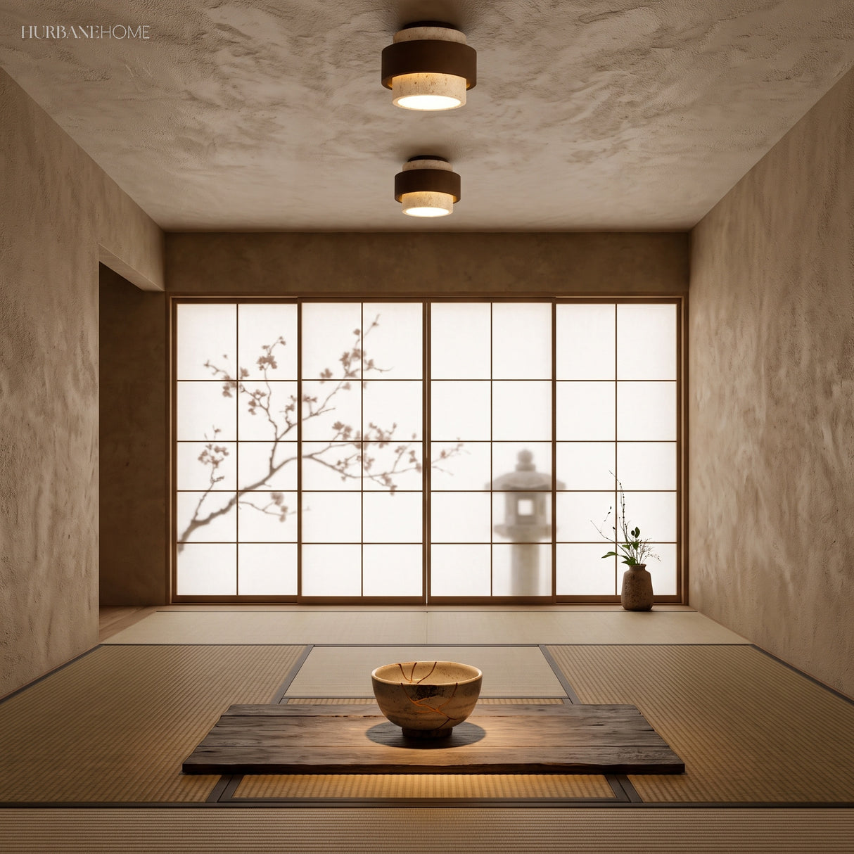 Two travertine ceiling lights lighting a minimalist tatami room with shoji screens