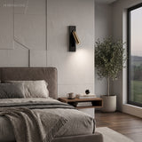 bedside reading wall sconce with rotating LED