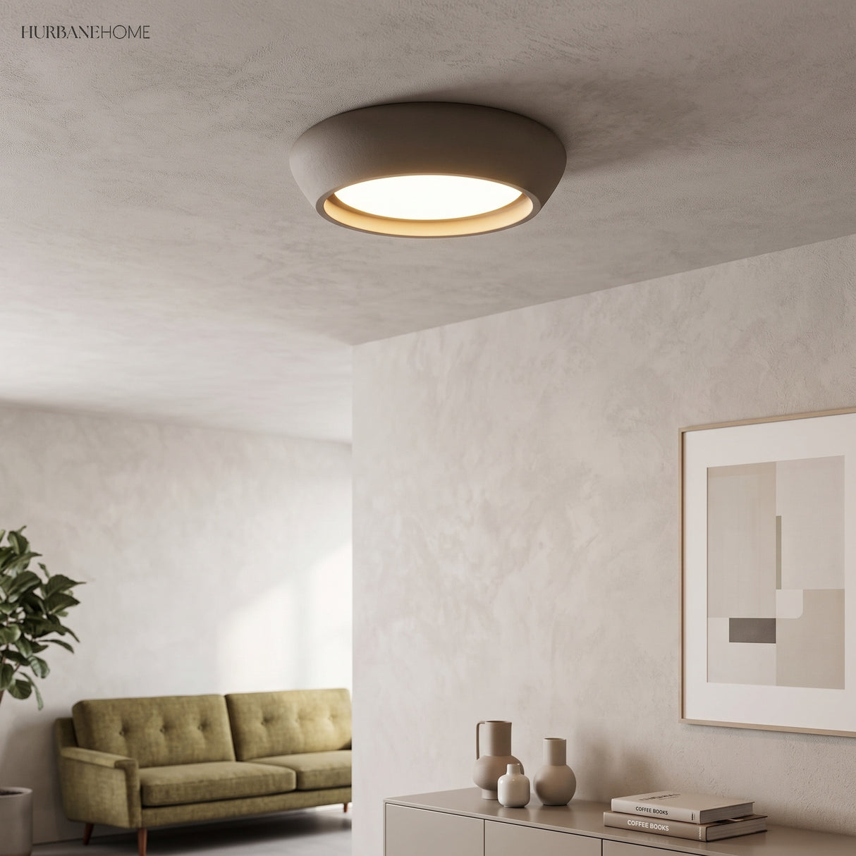 Taupe cement dome ceiling light glowing softly over a warm plaster living room