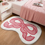 Light pink carpet bedroom with plush tufted bow design