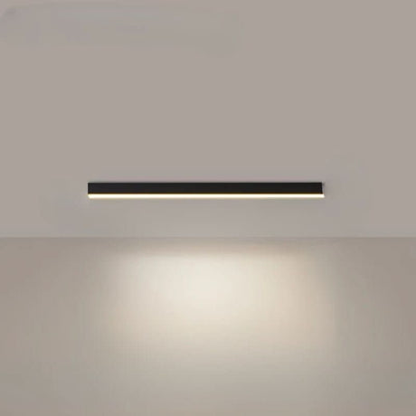 Linear LED ceiling light glowing warm over a modern interior scene