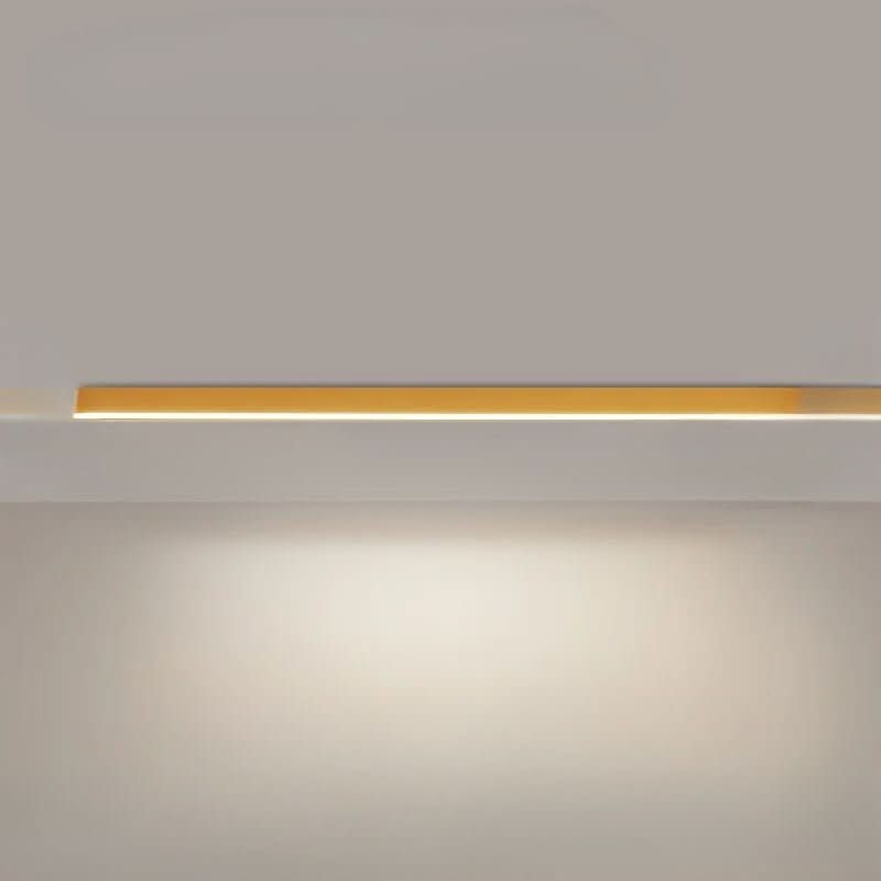 Long linear LED ceiling fixture running across a modern room ceiling
