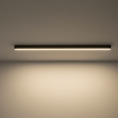 Black linear LED ceiling bar shown lit against a plain white ceiling