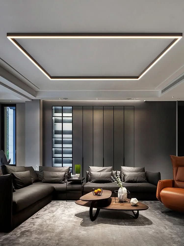 Slim LED ceiling bar casting even light down a modern hallway