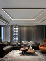 Slim LED ceiling bar casting even light down a modern hallway