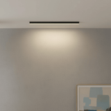 Close view of the slim aluminum linear LED fixture with glowing diffuser