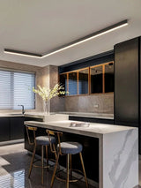 Black linear LED ceiling light angled to show its low profile shape