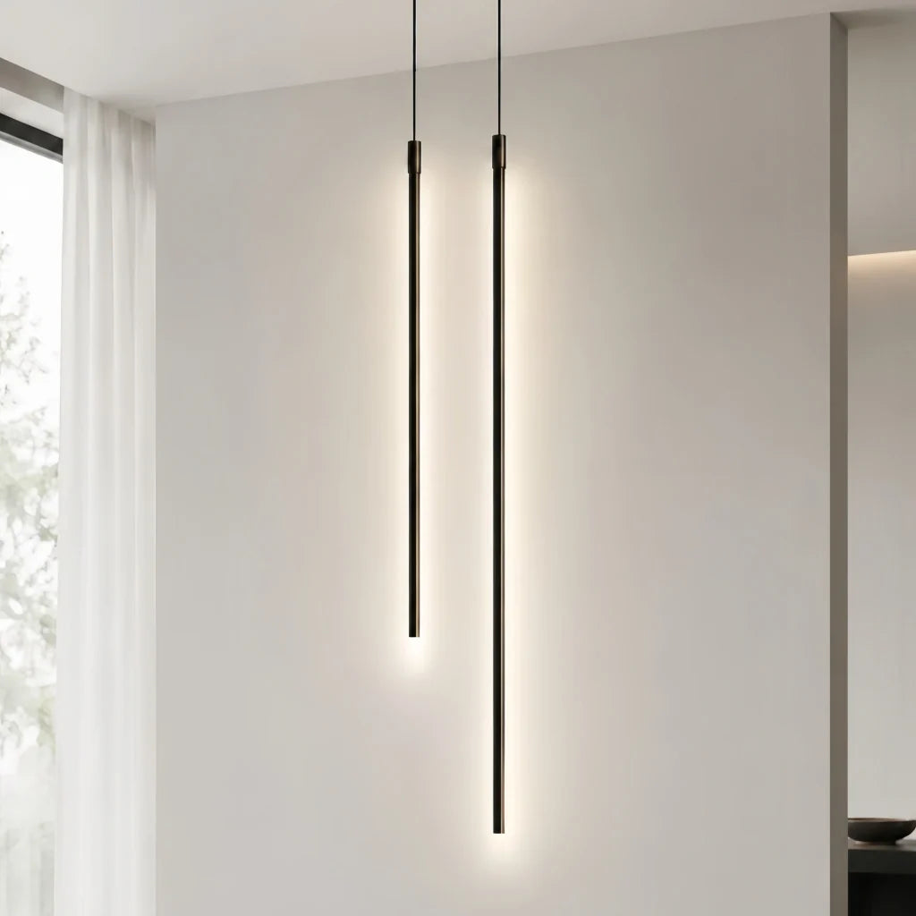 Black linear tube pendant light shown as a hanging pair